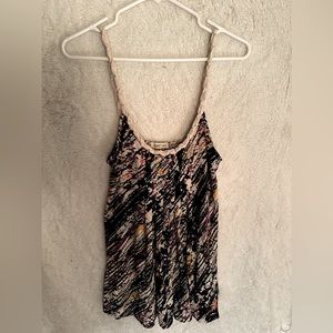 Fun splashy paint type of vibe tunic tank top! Perfect for summer at the beach.